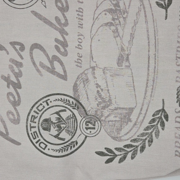 The Hunger Games Peeta's Bakery Cream Tote Bag - Picture 13 of 16